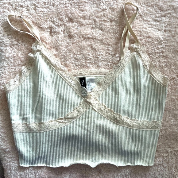 Cream tank top with adjustable straps and lace trim - Picture 1 of 2